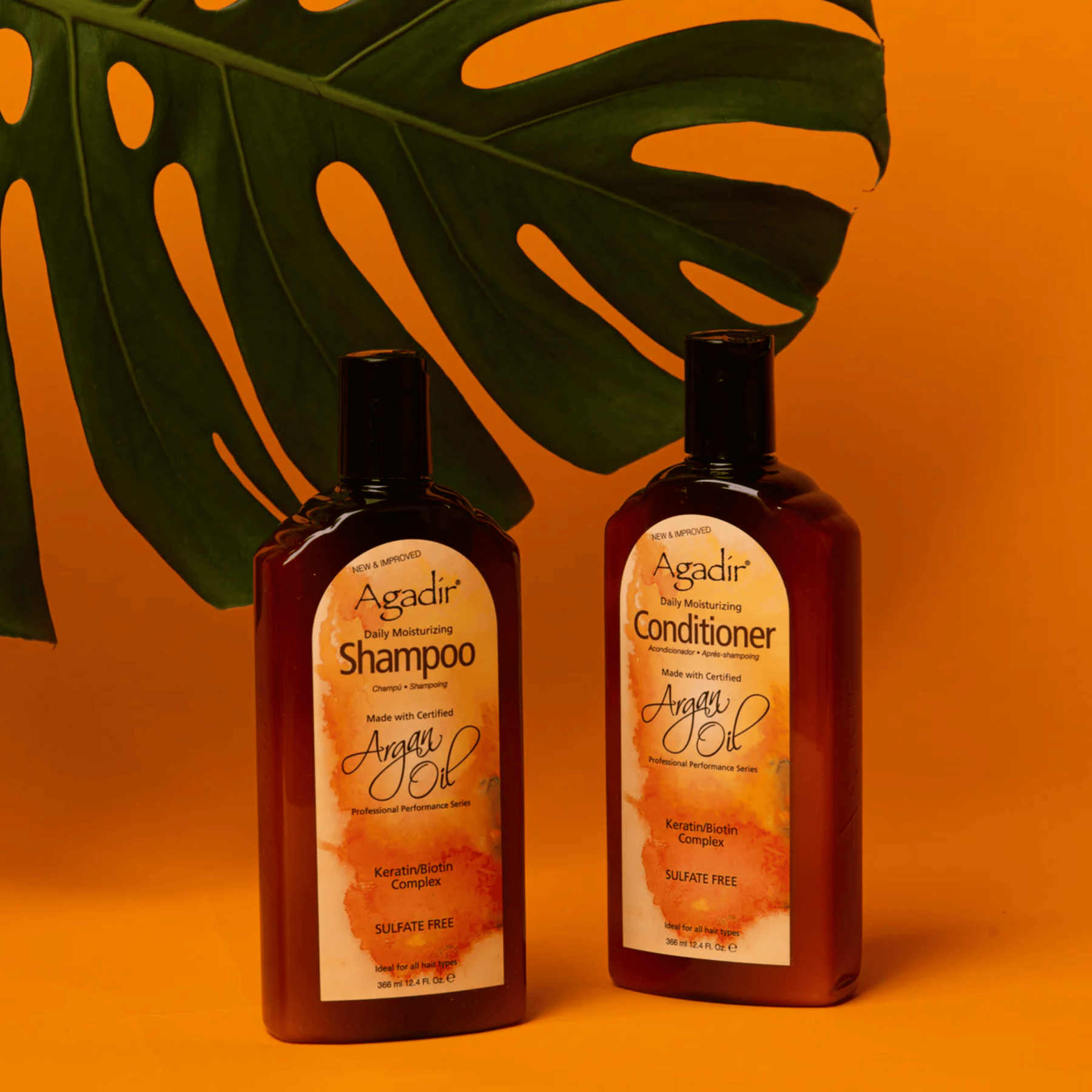 Agadir Argan Oil Daily Moisturizing Shampoo and Conditioner Orange Background